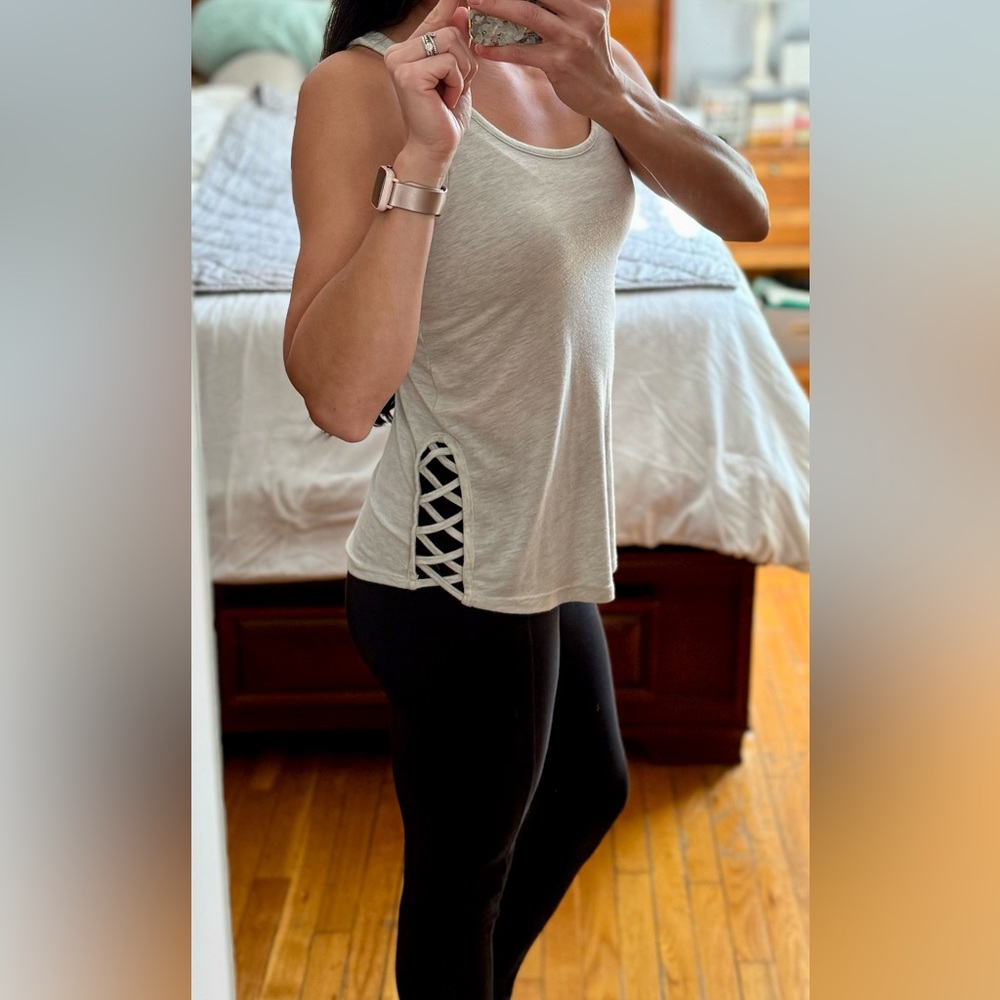 Poof! tank with side detailing.